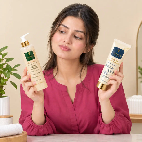 Woman comparing two VOVÉSKIN cleansers to choose the right one for her skin type.