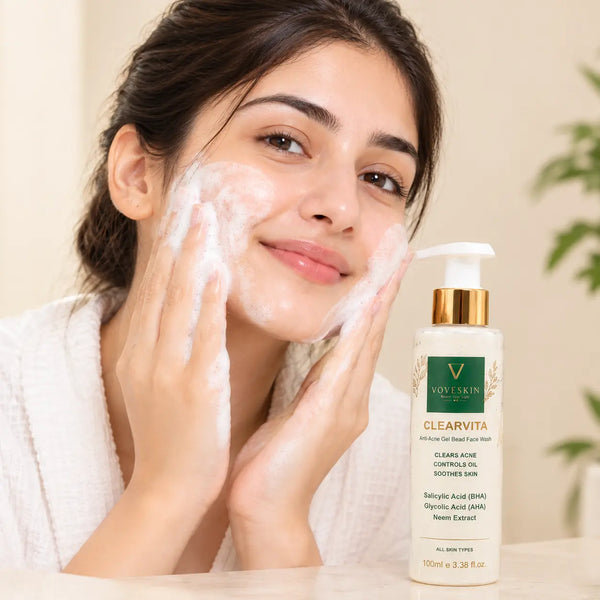 Girl applying Clearvita Anti-Acne Face Wash with product visible.