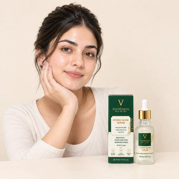 A natural-looking woman with healthy skin beside VOVESKIN Hydro Glow Serum and its packaging.
